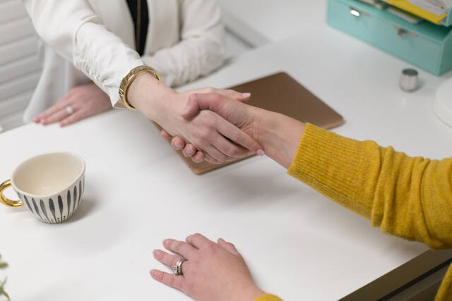 Photograph of agreement, city, collaboration.