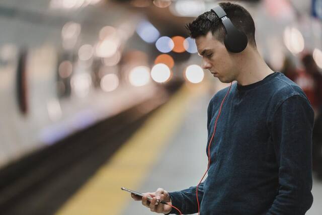 Photograph of alone, earbuds, gadget.